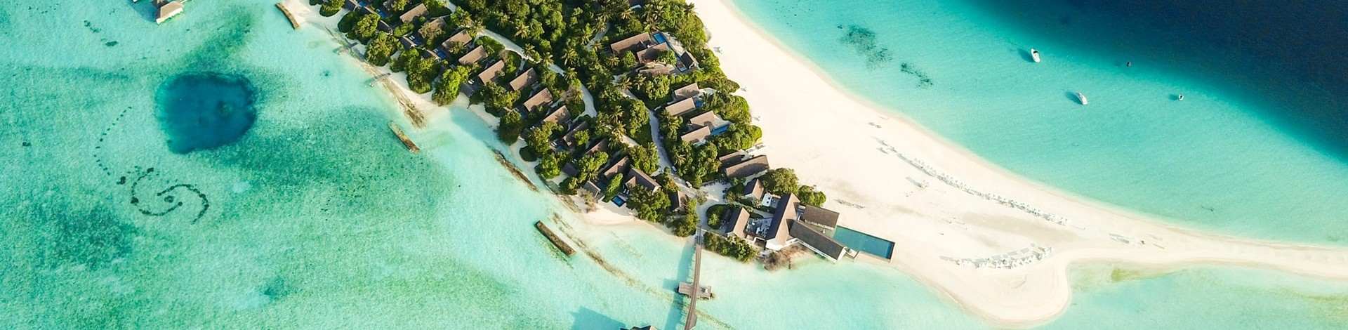 Olhuveli Maldives atoll eau paradisiaque sable fin plage