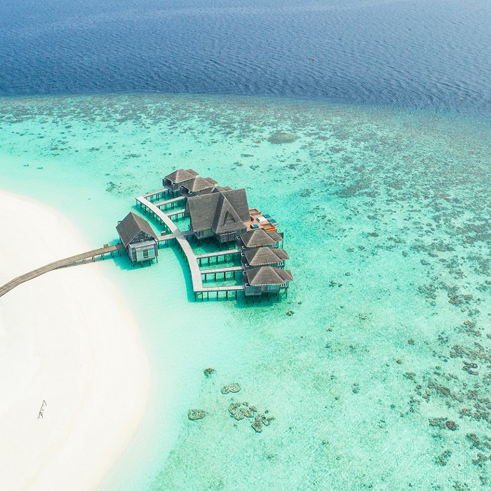 voyage tourisme maldives pilotis eau turquoise lagon
