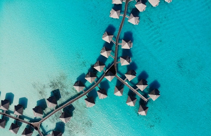 Tahiti Bora Bora Moorea Raiatea Polynésie Française paradisiaque plage sable blanc turquoise atoll logement